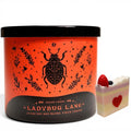 Ladybug Lane Scented Candle, 14.5oz Soy Wax Blend 3 Wick, Orchard Peach Raspberry Wildflower Fragrance & Artisanal Shortcake Soap Gift